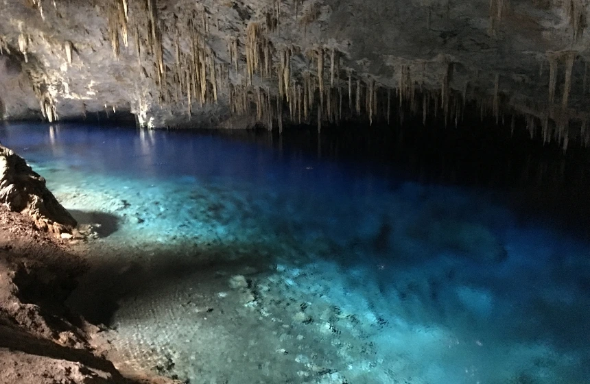 a-blue-colored-water-inside-a-cave