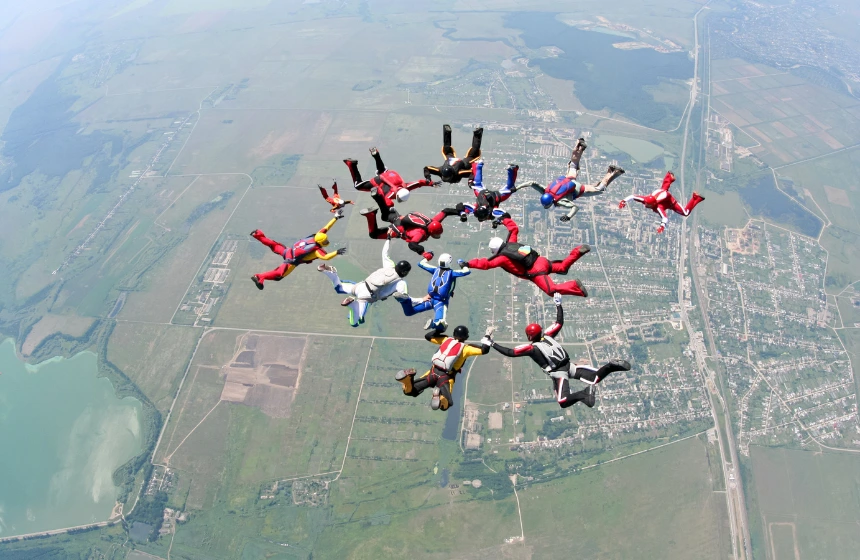a-group-of-sky-divers-falling-from-sky-and-creating-a-parttern