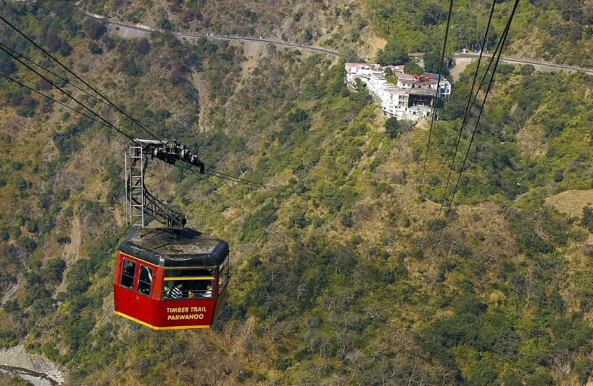 cable car moving with tourists