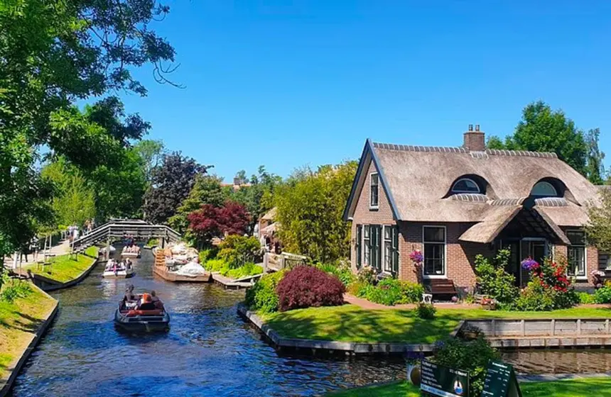 a river floating in front of houses